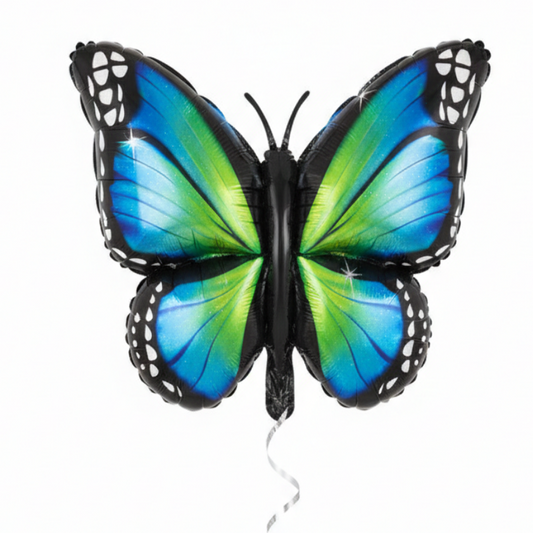 Butterfly-shaped balloon with blue and green wings on a white background