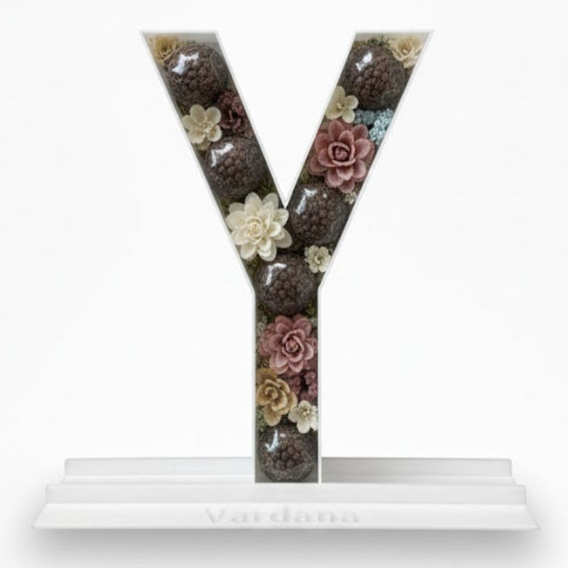 Decorative letter 'Y' with floral pattern 