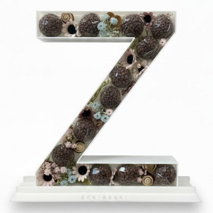 Decorative letter 'Z' with a floral pattern 